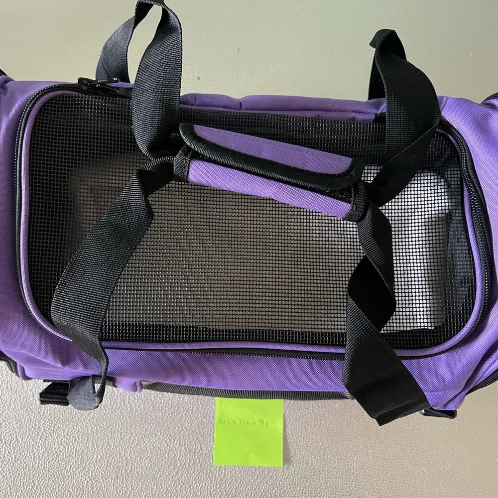 Purple dog/cat carrier. Size S-M. New.